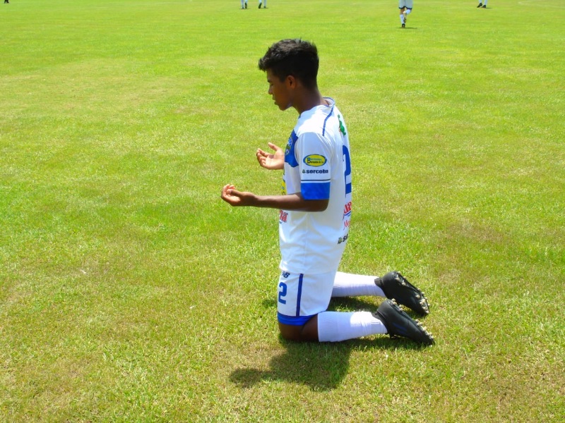 Giving thanks to God at his futbol (soccer) game