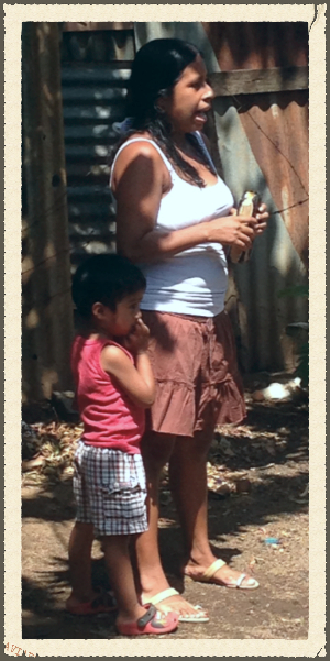 Ana sharing God's word with the kids