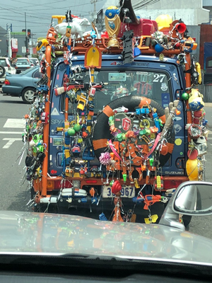 Image of car decorated with toys.